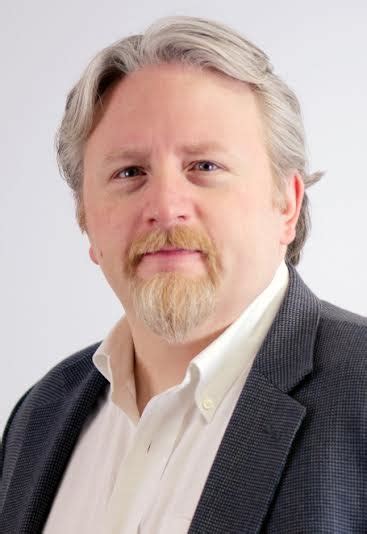 Portrait of Mark Tomlinson